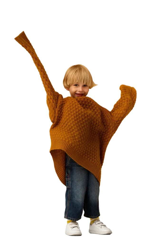 front-view-smiley-kid-posing-studio